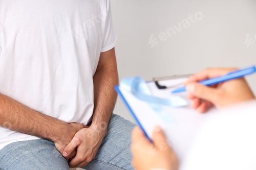 Preview: A man at a doctor's appointment, Movember concept