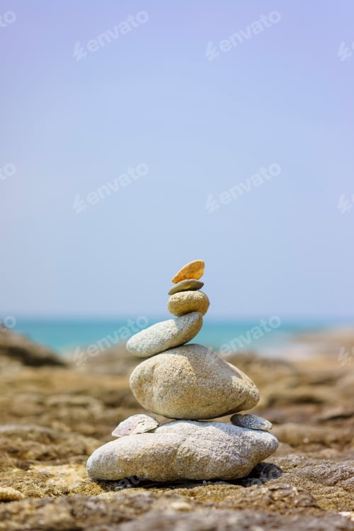 Preview: stacks of stones on the beach