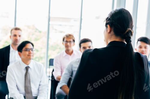 Preview: Female leader doing presentation for coworkers
