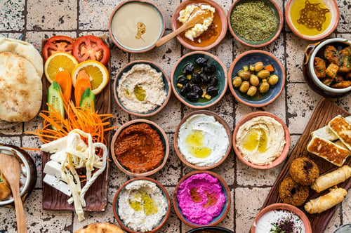 Preview: Traditional Turkish Village Breakfast on the ceramic table with pastries, vegetables, greens, spread