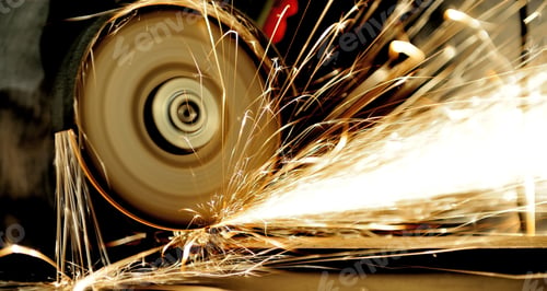 Preview: Worker cutting metal with grinder