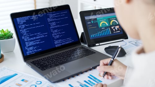 Preview: Back rear view of young asian woman, freelance data scientist work remotely at home coding