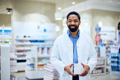Preview: Smiling Pharmacist in White Coat Standing in a Modern Pharmacy Interior