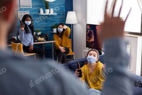 Preview: Man coming at party with friends wearing face mask