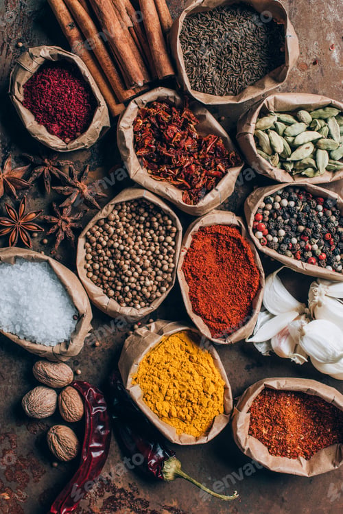 Preview: top view of salt, chilli flakes and powdered pepper in paper bags on table