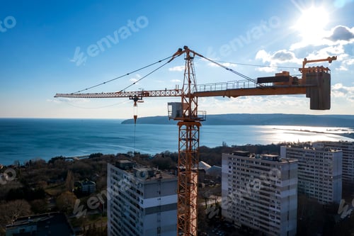 Preview: tower crane against a blue sky