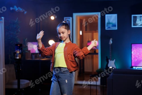 Preview: Joyous gen Z dancer recording video in apartment studio for internet audience