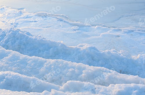 Preview: Winter beautiful landscape of frozen Japan Sea covered with ice and snow on a sunny day.