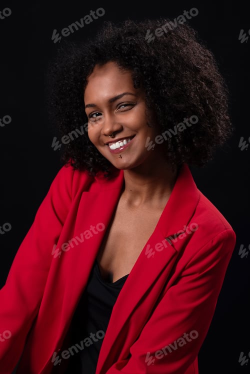 Preview: Smiling ethnic woman in red trendy outfit