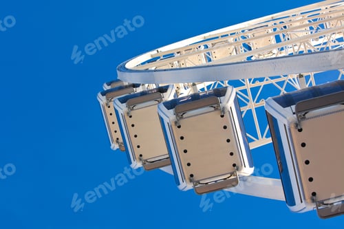 Preview: big ferris wheel on blue sky background