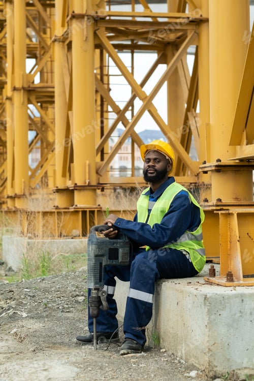 Preview: Construction worker sitting outdoors