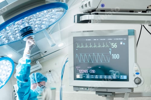 Preview: Medical monitor showing the patient's status while surgeons works