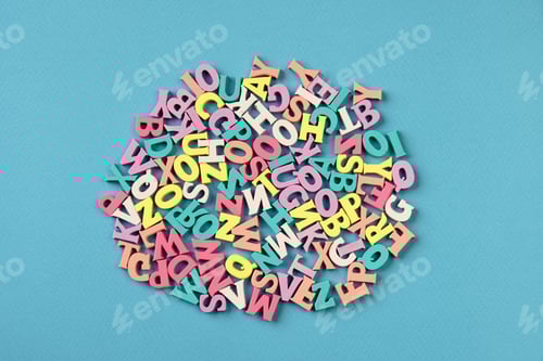 Preview: Background with many multicolored letters. Back To School. School studies, teaching to read.