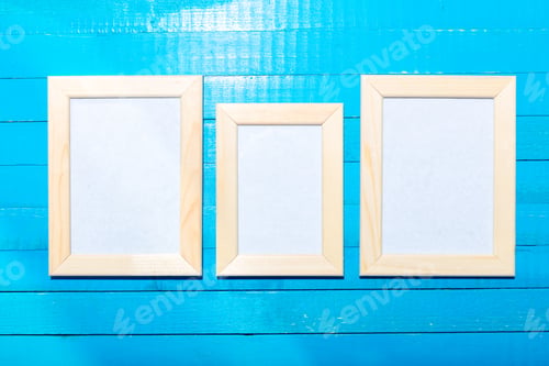 Preview: photo frames on the wooden wall