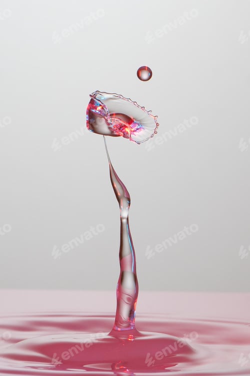 Preview: Splash of colorful liquid with high speed flash