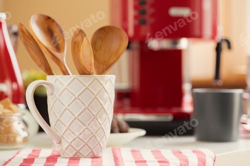 Preview: Kitchen utensils in cup on table close up
