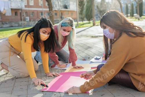 Preview: Multicultural group preparing together feminist movement womens international day 8m