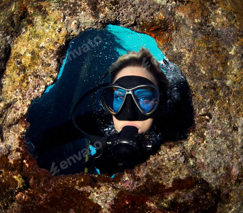 Preview: Scuba diver exploring underwater cave