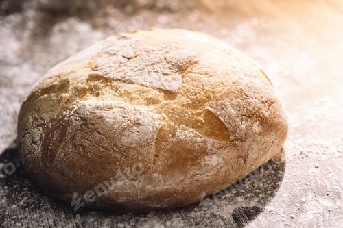 Preview: rustic bread illuminated by the morning sun