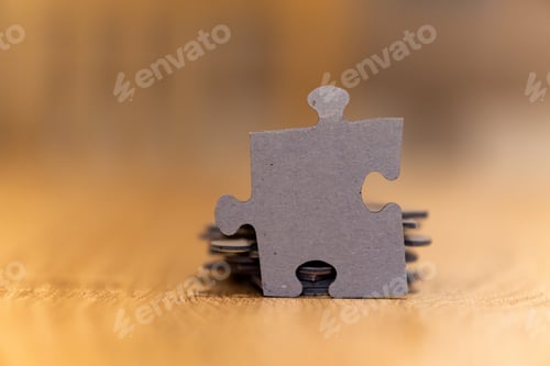 Preview: Selective focus shot of a puzzle piece with space for text
