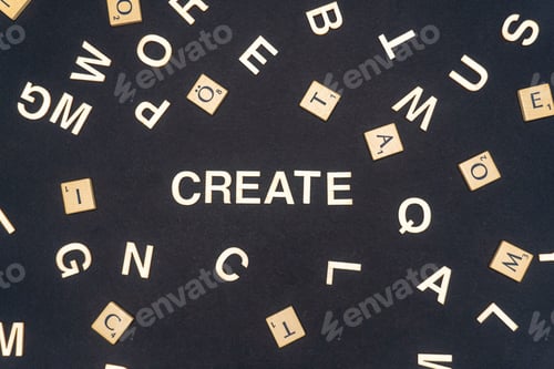 Preview: CREATE word written on dark paper background. CREATE text for your concepts