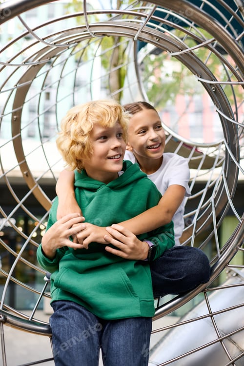 Preview: Children enjoying playful moments together in a vibrant autumn setting