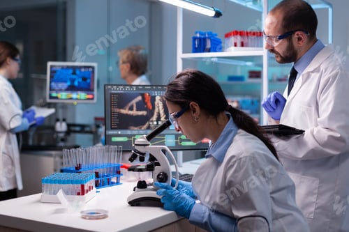 Preview: Team of medical research scientists analyzing virus disease