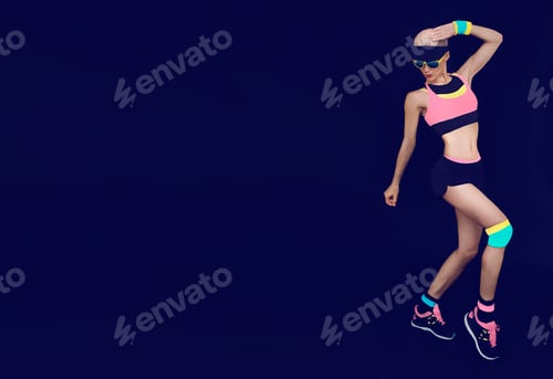 Preview: Slim blonde, fitness, sport, dance, on a black background in the