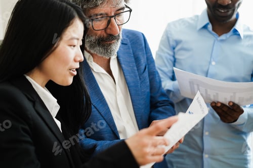 Preview: Multiracial business people working inside bank office - Main focus on senior man eyeglasses