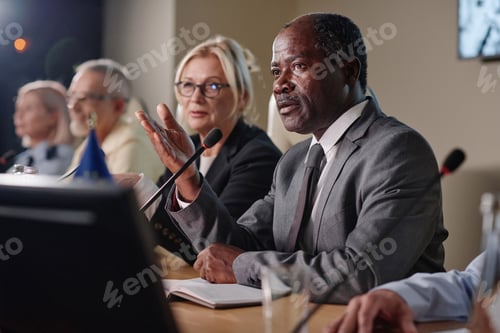 Preview: Businessman speaking his speech in microphone
