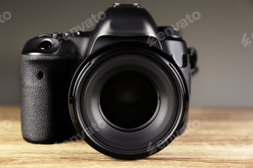 Preview: Digital camera of professional photographer on table
