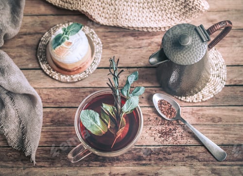 Cup of Tea with Cake and Tea Pot