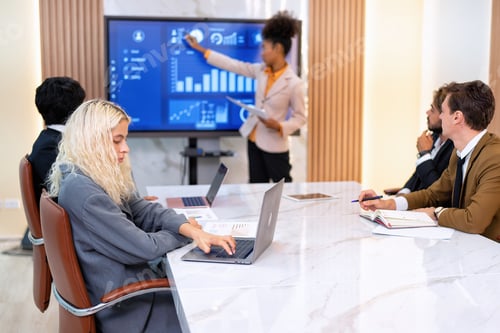 Preview: Employee on job corporate Business colleagues around the table look presentation from large screen