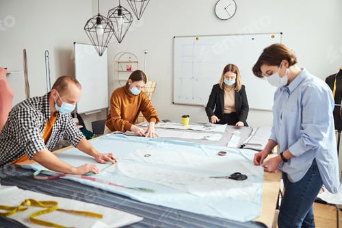 Preview: Student group is learning tailoring in classroom