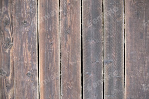 Preview: Close-up of natural old vintage weathered gray brown unpainted solid wooden fence