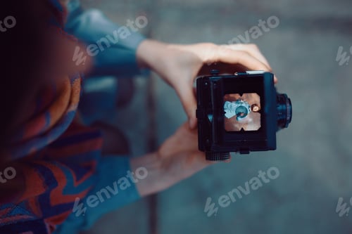 Preview: Shooting a portrait of handsome guy with a vintage camera