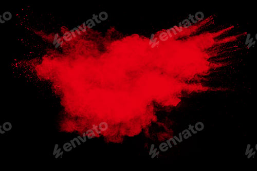 Preview: Red powder explosion cloud on black background. Freeze motion of red color dust particle splashing.