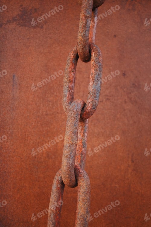 Preview: detail of a rusty old chain link on a metal background