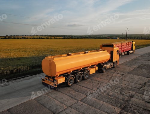 Preview: Modern bright trucks parked on country road