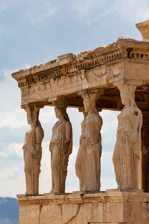 Preview: Temple of Erechtheion with the Caryatids statues in Acropolis, Greece against a blue sky