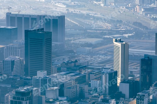 Preview: General view of cityscape with multiple modern buildings and skyscrapers in the morning
