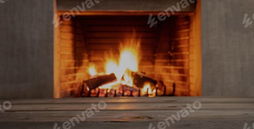 Preview: Table on blur burning fireplace background. Empty wooden planks, space.