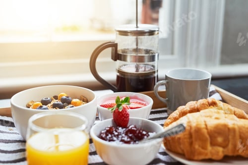 Preview: Breakfast is ready. Shot of breakfast on a table indoors.