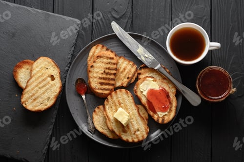 Preview: Continental Breakfast meal served with coffee, toast, jam and butter. Delicious coffee table.