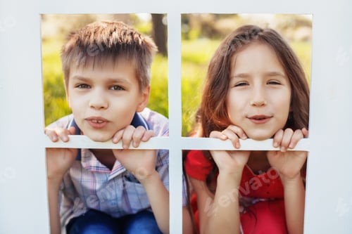 Preview: little boy and girl looking in the window. The concept of childhood and lifestyle.