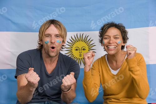 Preview: Couple smiling with Argentinian flag