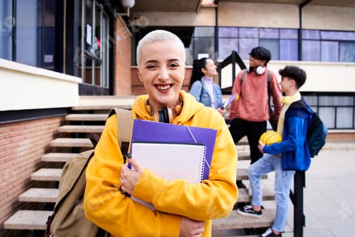 Preview: Close up shot of cheerful happy caucasian teenage girl looking at camera smiling.