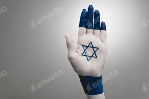Preview: cropped view of female hand with blue star of david on grey