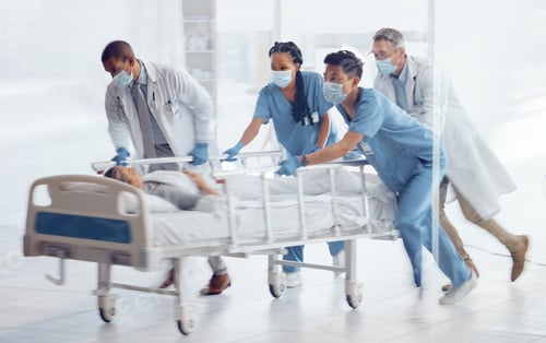 Preview: Doctors, team and hurry with bed in hospital for medical emergency, surgery operation and first aid