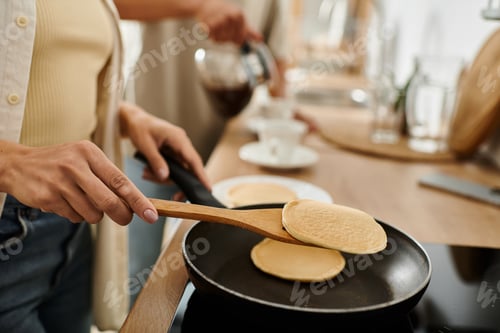 Preview: Cozy moments of love and laughter while cooking pancakes at home together